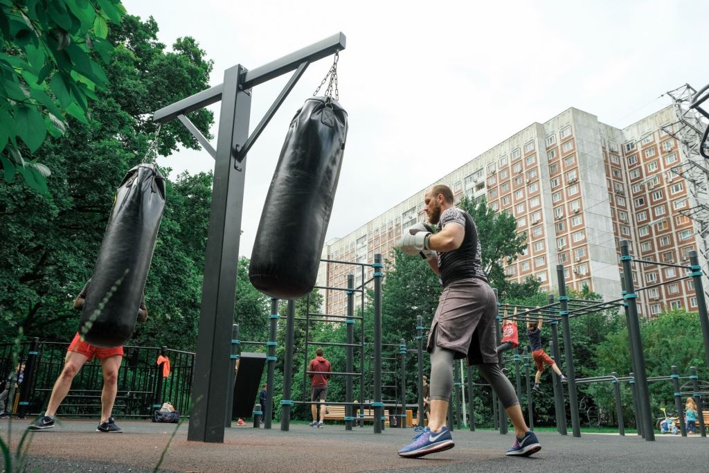 Sports cluster in the city park boxing panna football workout